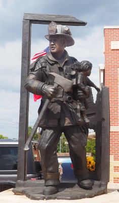 Statue in front of the Bastrop fire station