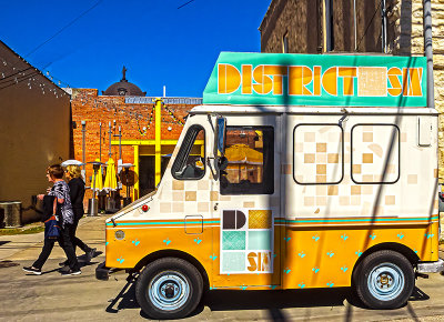 District six van with passersby's. 1/30)