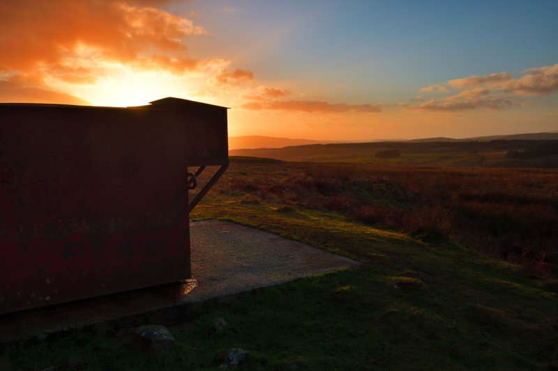 Quarry hardware and the setting sun.