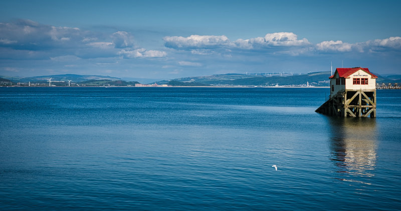The old lifeboat station in a calm bay.