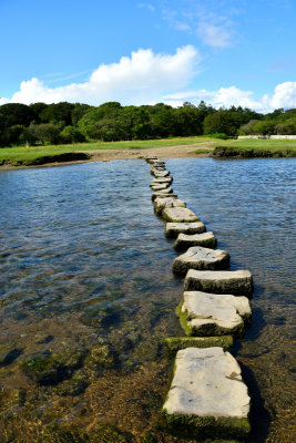 Stepping stones across the tidal River Ogmore.