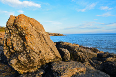 Triassic conglomerate limestone slab upending by the power of the sea.