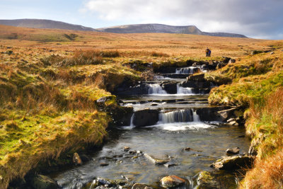 Hikers returning from Llyn y Fan Fawr, the source of the Tawe.