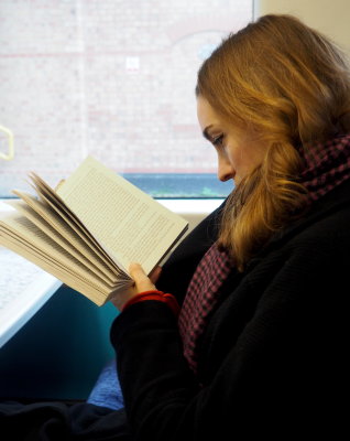 Francesca Reading on the Train #1. Dec. 2019 P1010540.JPG