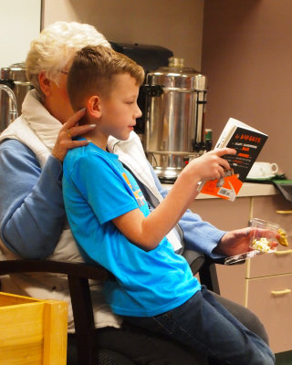 Grandma w Grandson Reading PSRS P1010760.jpg