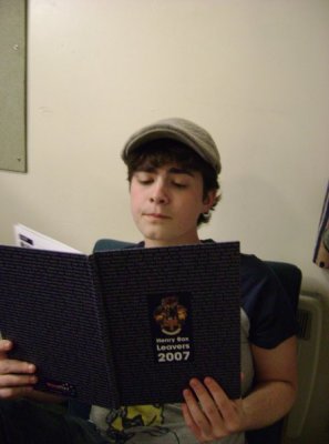 Max reading Henry Box Leavers Yearbook.jpg