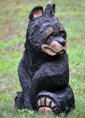 Turned sitter bear