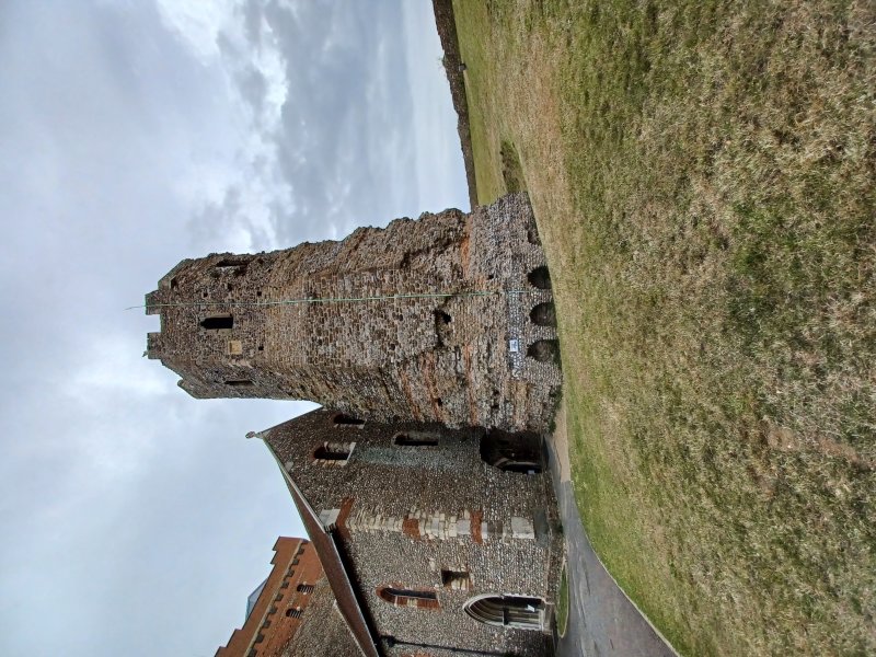 Roman lighthouse (AD 130) made of layers of tufa, Kentish ragstone, and red bricks is Britain's oldest standing building 