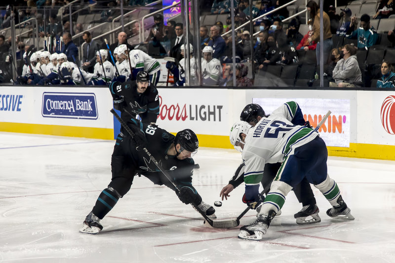 2/17/2022  Faceoff between Logan Couture and Bo Horvat