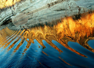1022: Reflections of sunlit cliffs