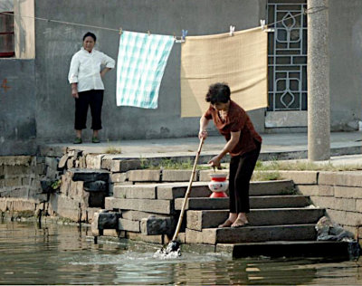 Housework beside the canal