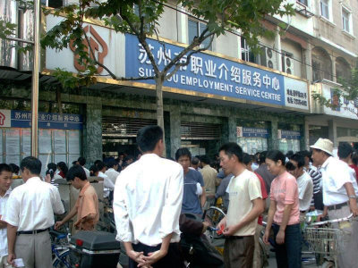 Crowd outside employment agency