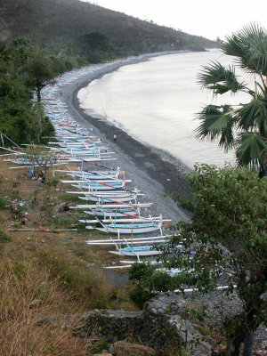 Fishing boats on a black beach, NE Bali