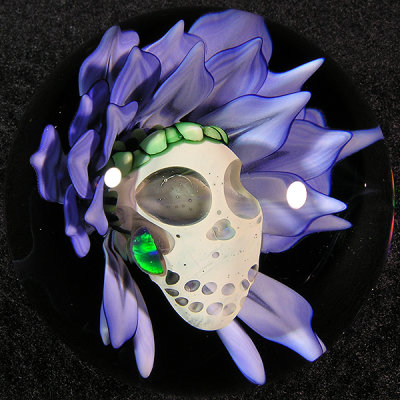 The skull blooms out of a perfect flower created by John