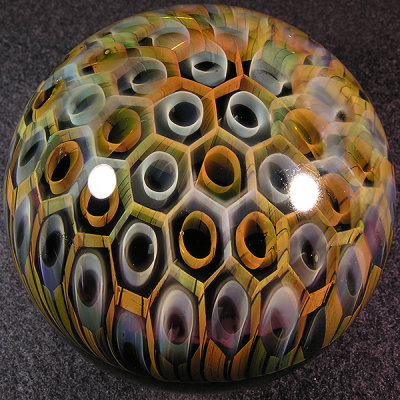 Ryan put this piece together with his amazing complex honeycomb wrapped around it