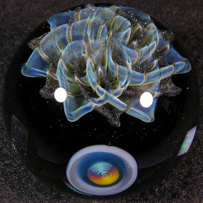 Josh put the marble together and added his milli and some opals around the equator