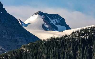 Pristine snow on the side of a peak in Glacier National Park
