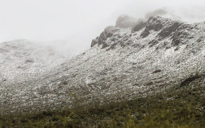 Snowy cloud covered mountainside in Tucson Mountain Park