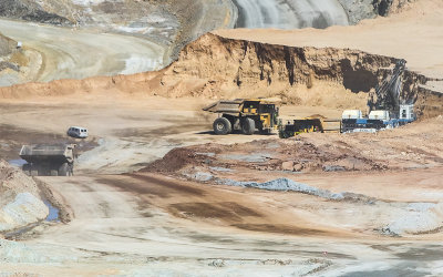 Excavator shovels load haul trucks in the ASARCO Copper Mine