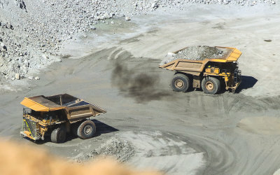 Haul trucks on the floor of the ASARCO Copper Mine