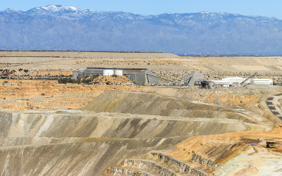 Ore crushing and refining complex with the Catalina Mountains in the distance at the ASARCO Copper Mine