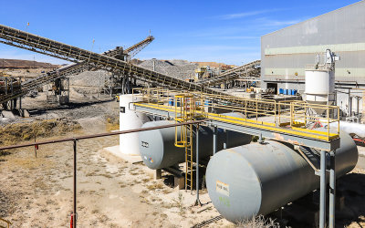 Conveyer belts and chemical holding tanks at the refining complex of the ASARCO Copper Mine