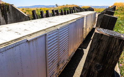 Boxcars in a fortified revetted siding in Port Chicago Naval Magazine National Memorial