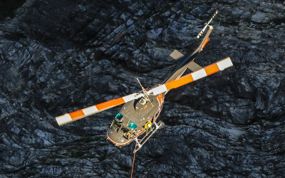 Looking down on a Search and Rescue helicopter as seen from Taft Point in Yosemite National Park