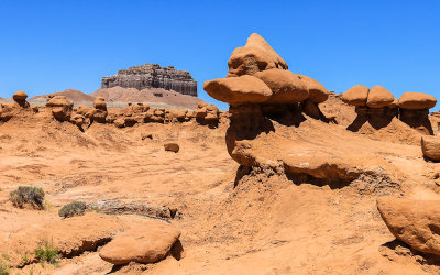 Wild Horse Butte and sculpted geologic formations in Goblin Valley State Park