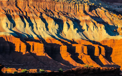 The sunset reflected in the colorful sandstone of Capitol Reef National Park