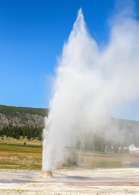 The Beehive Geyser erupts in the Upper Geyser Basin in Yellowstone National Park