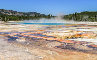 Rainbow Pool (foreground) and Sunset Lake in the Black Sand Basin in Yellowstone National Park