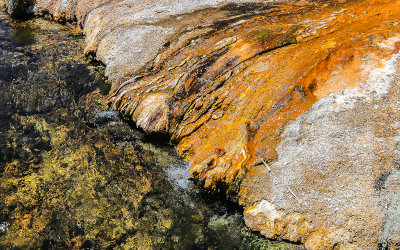 Spring water flows into the Little Firehole River in the Black Sand Basin in Yellowstone National Park