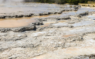 Mineral terraces of the Great Fountain Geyser along the Firehole Lake Drive in Yellowstone National Park