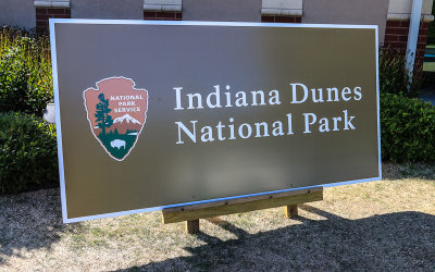 Visitor Center park sign, not yet permanently mounted, in Indiana Dunes National Park