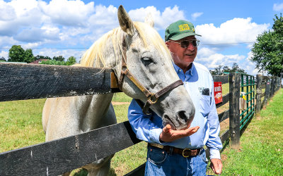 Farm founder Michael Blowen with Silver Charm at Old Friends Farm