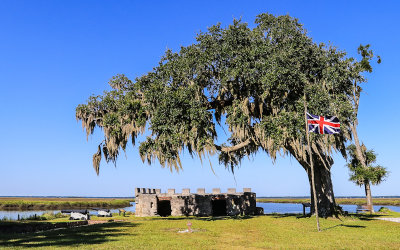 An early flag of Great Britain flies over the remains of the Magazine Building in Fort Frederica National Monument 