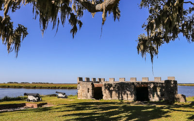 Canons and the Magazine Building on the shore of the Frederica River in Fort Frederica National Monument