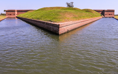 Demilune and moat in front of the fort in Fort Pulaski National Monument 