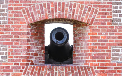 Wall port and cannon in Fort Pulaski National Monument