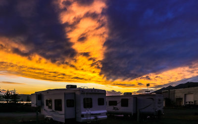 The sun coloring the clouds at sunset from the Valley View RV Park in Island Park Idaho