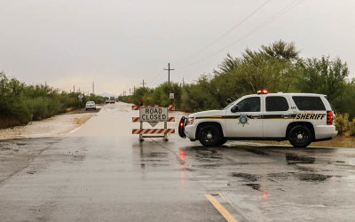 Road closed because of a flash flood near my home after a summer downpour in Tucson