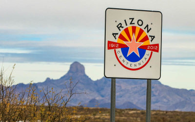 Arizona Centennial sign with Baboquivari Peak (7,730 ft) in the distance from the Arizona Border Zone