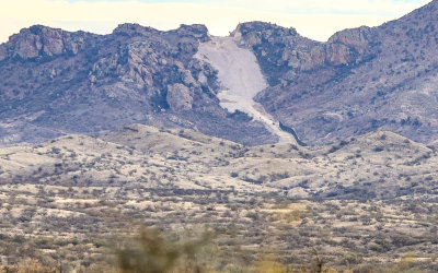 Excavated mountain route for the border wall in the Arizona Border Zone