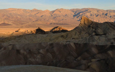 Sunrise touches Zabriskie Point in Death Valley National Park