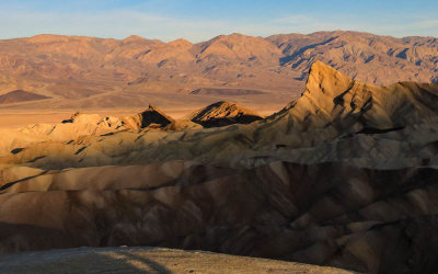 Zabriskie Point awash in early morning sunlight in Death Valley National Park