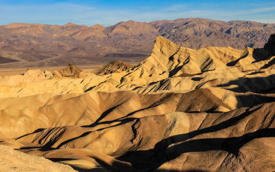 View of Zabriskie Point with the Panamint Range in the distance in Death Valley National Park