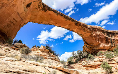 Owachomo Bridge framed by a blue sky in Natural Bridges National Monument