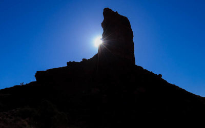 The early morning sun from around Castle Butte in Valley of the Gods