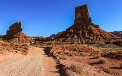 Stagecoach Rock and Castle Butte along the park road in Valley of the Gods